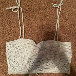 This is a hand crocheted baby blue Bikini/Bra.